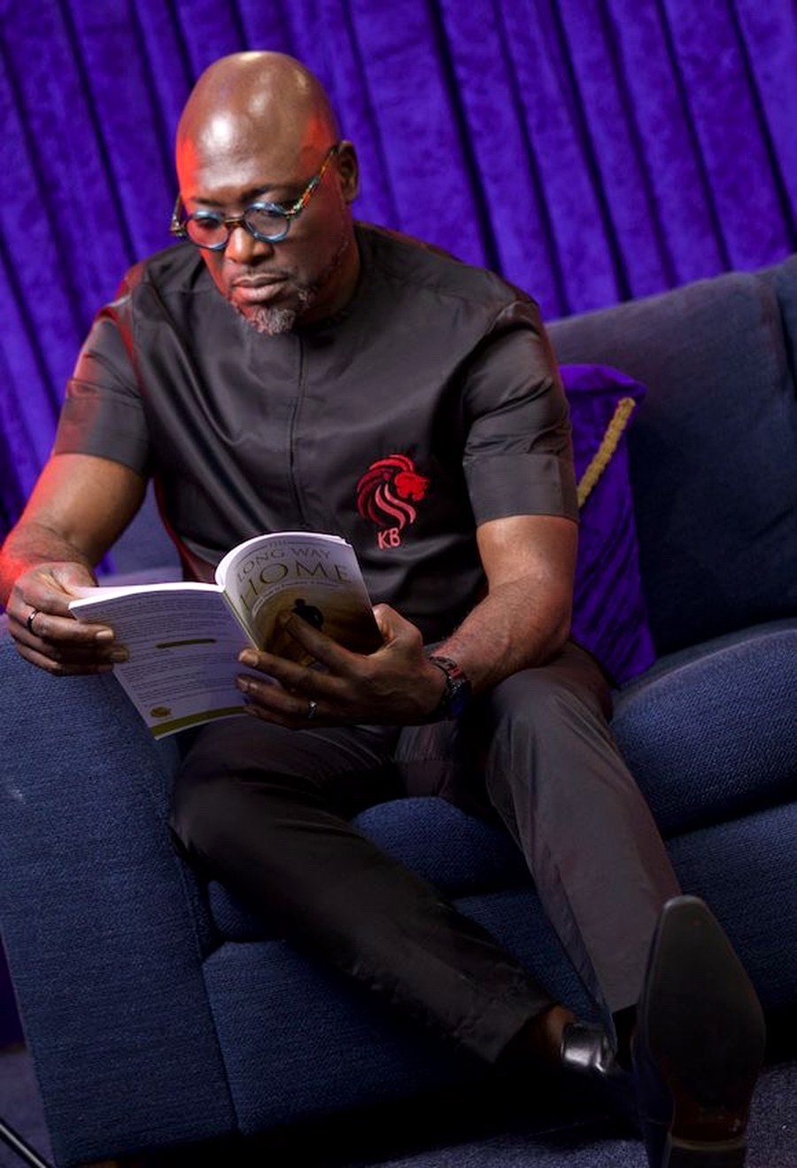 Kunle reading The Long Way Home